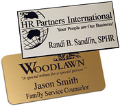 Standard name badge with engraved logo and text.